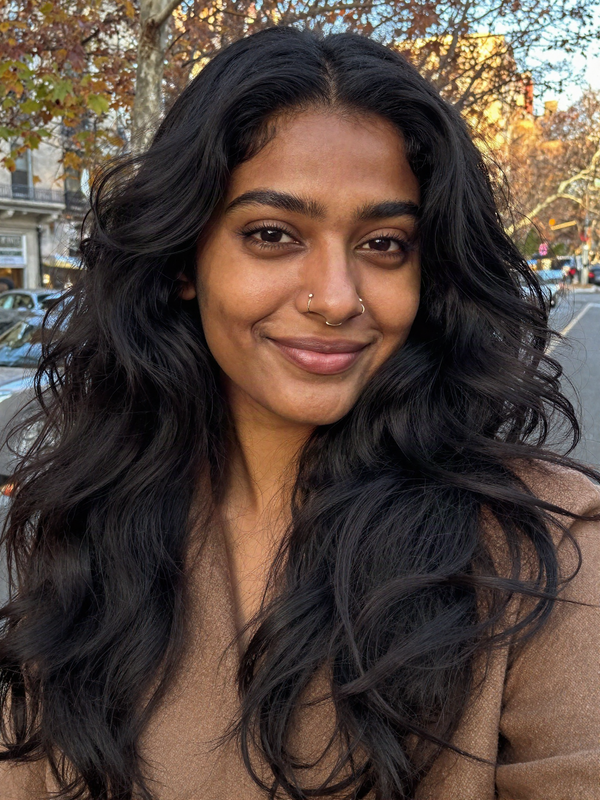 Outdoor selfie with a full voluminous black loose wave wig