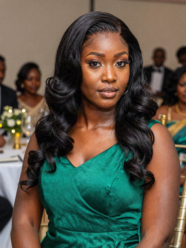 Half-up half-down wig style at a wedding